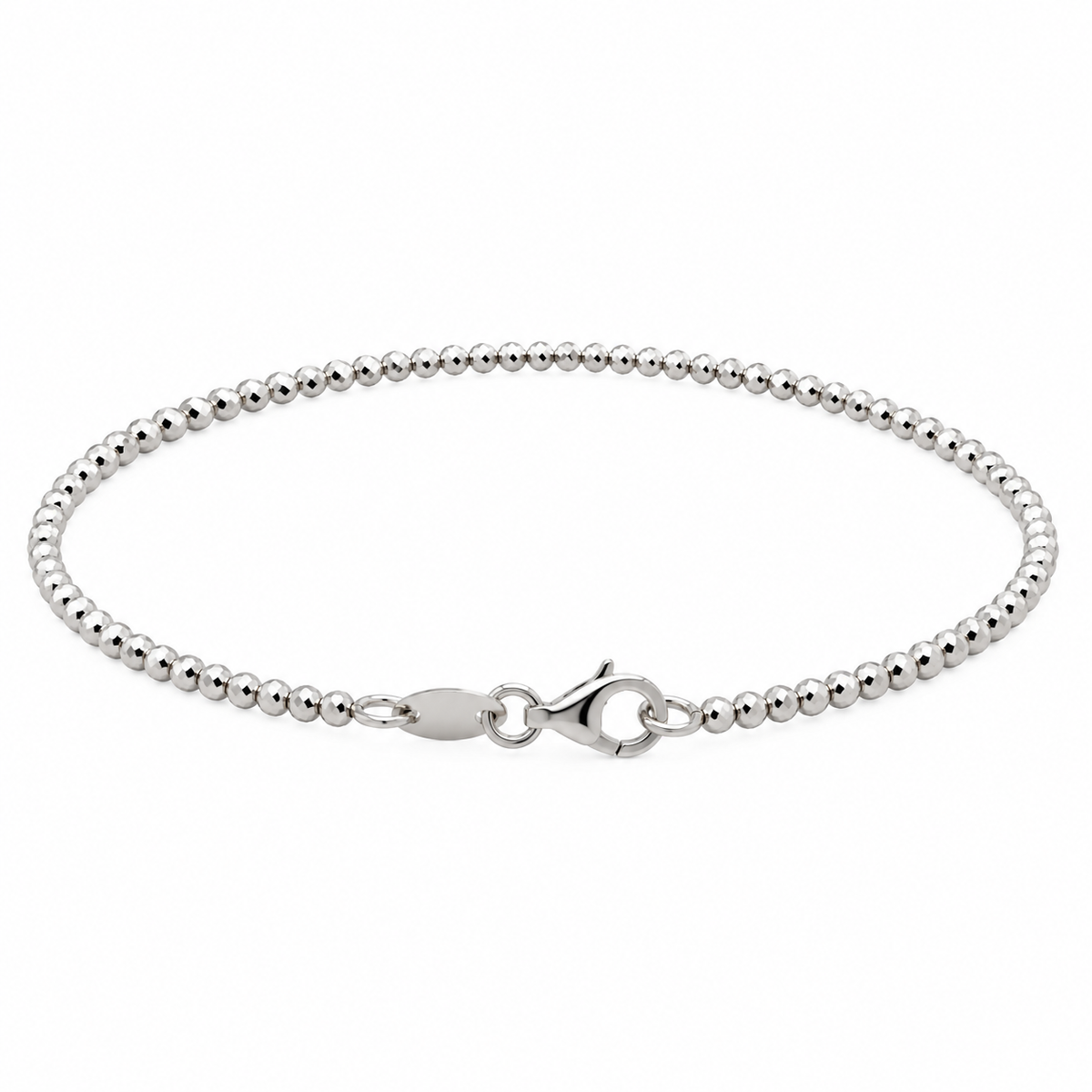 14KT white gold faceted bead bracelet featuring delicate light-reflecting beads and a lobster clasp.
