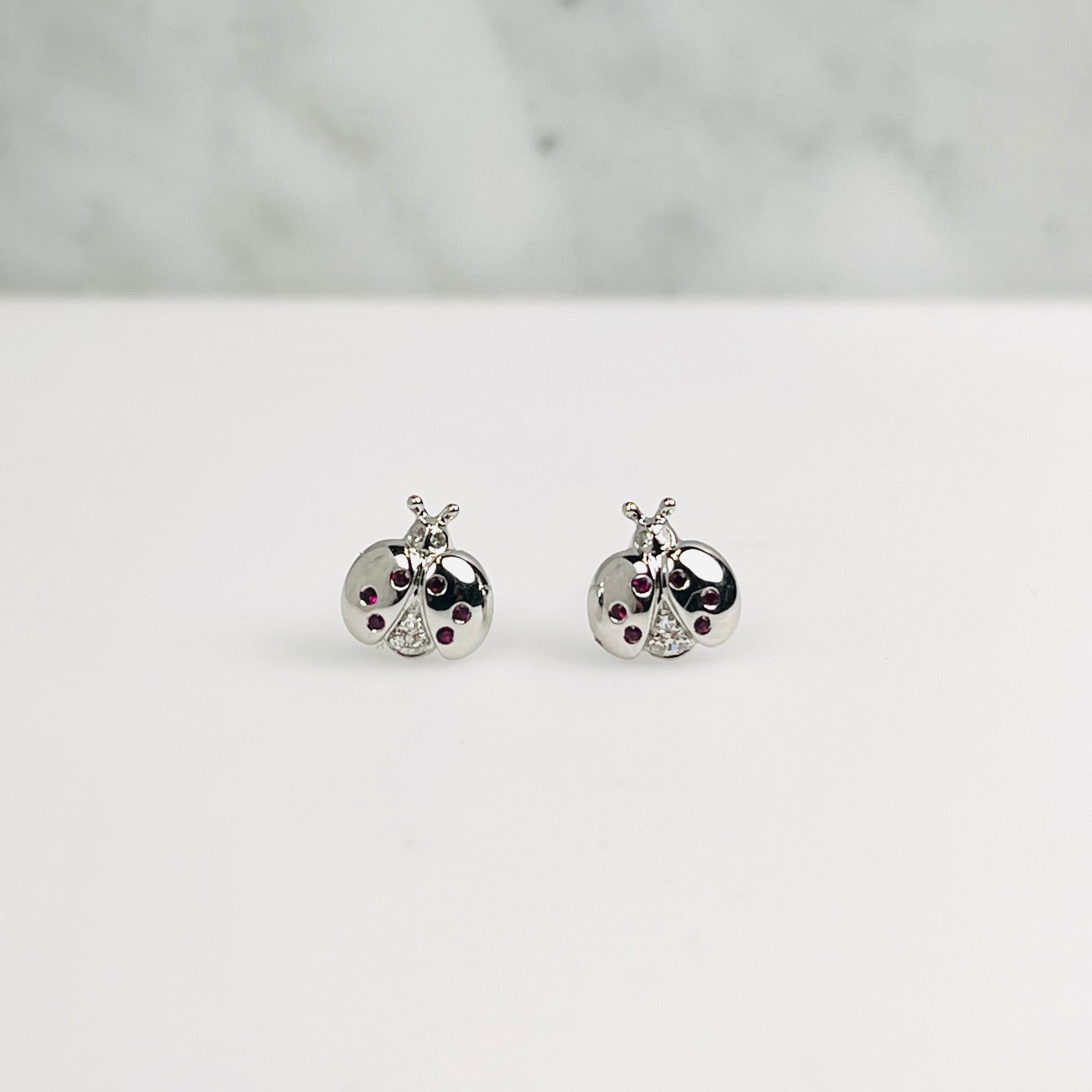 WD1014 14kt gold and Ruby ladybug studs