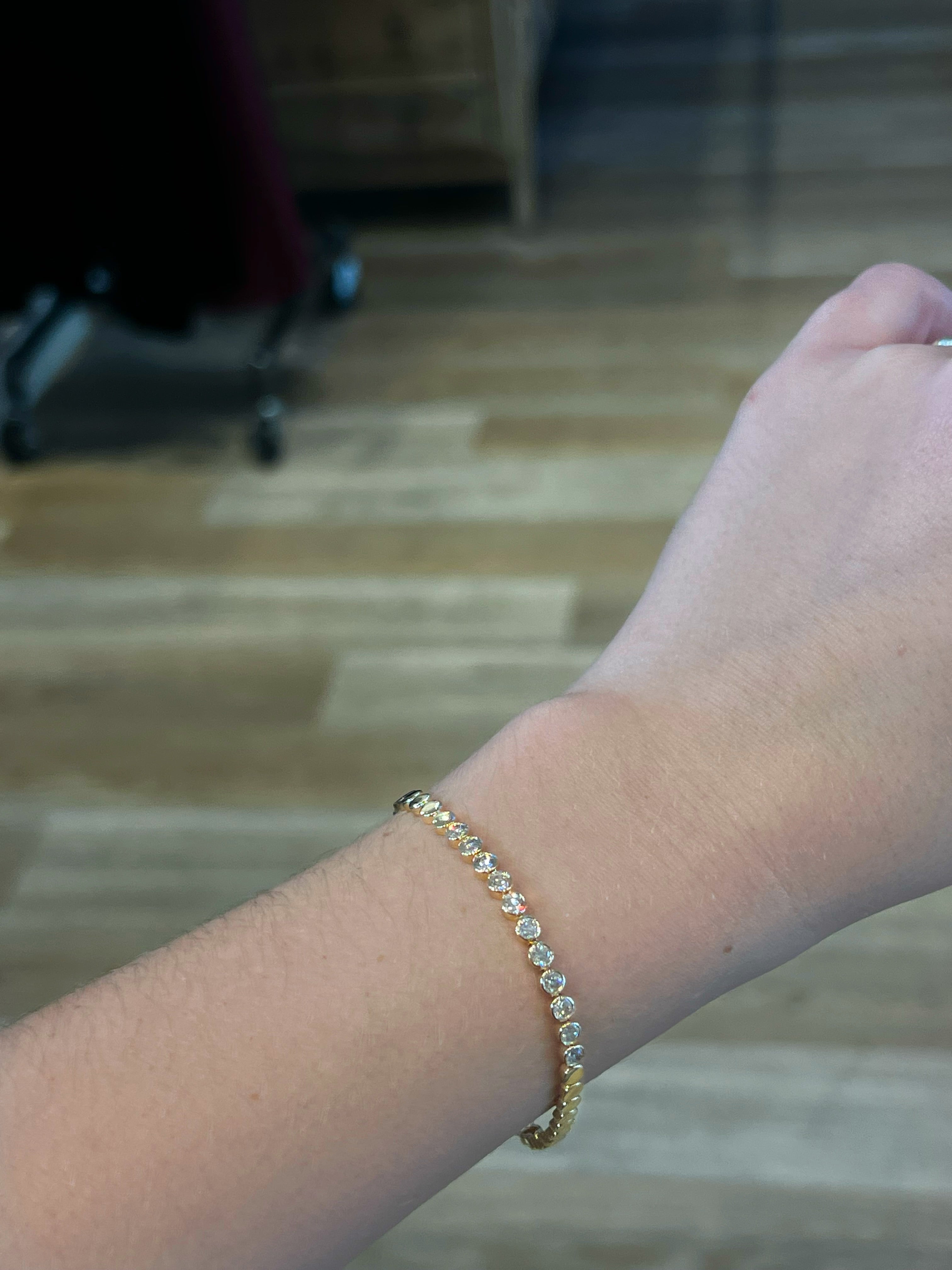 WD1893 14kt gold circle bracelet with bezel diamonds