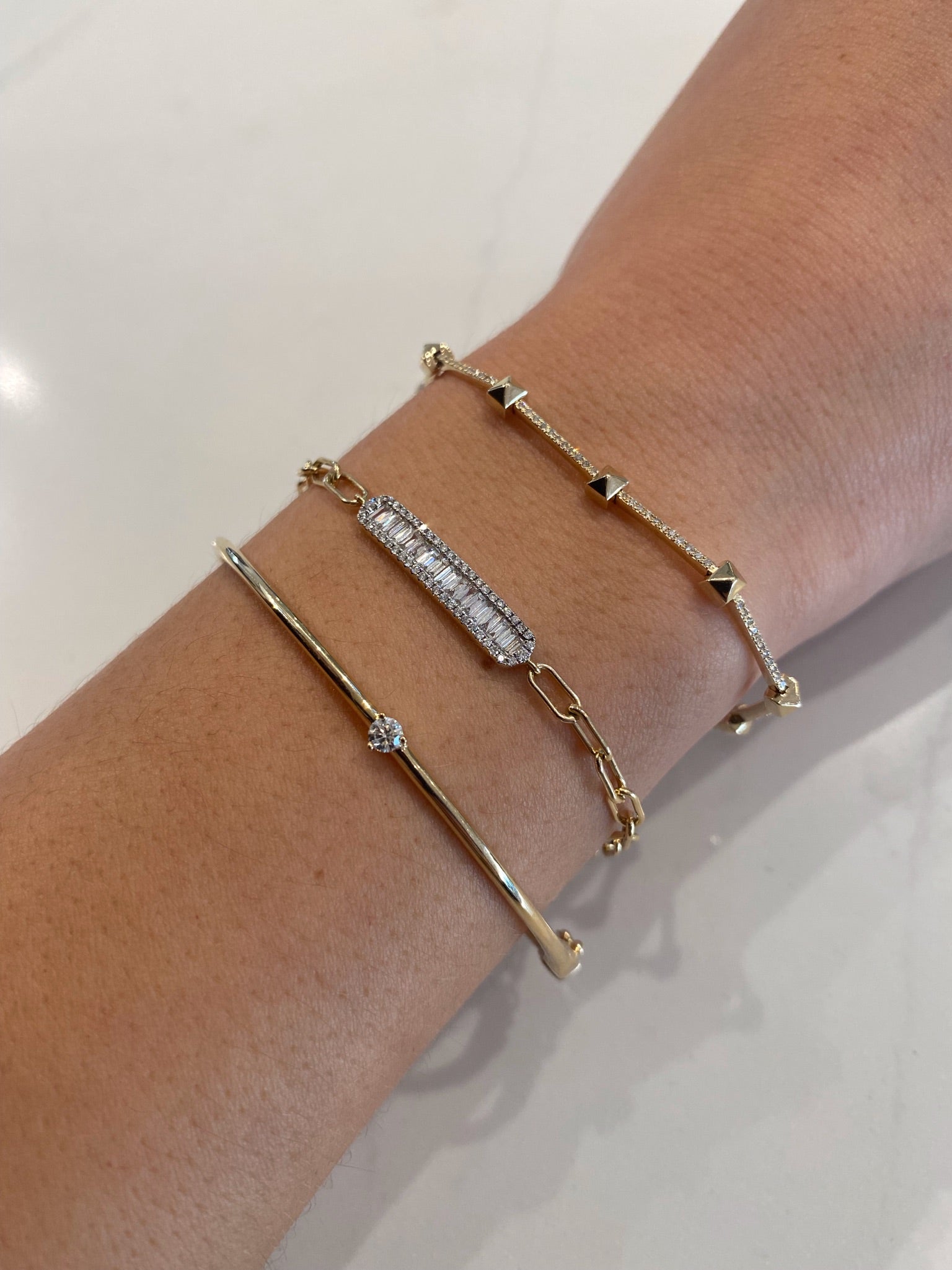 AD21, 14kt gold bracelet with pave diamond bars and stud detail