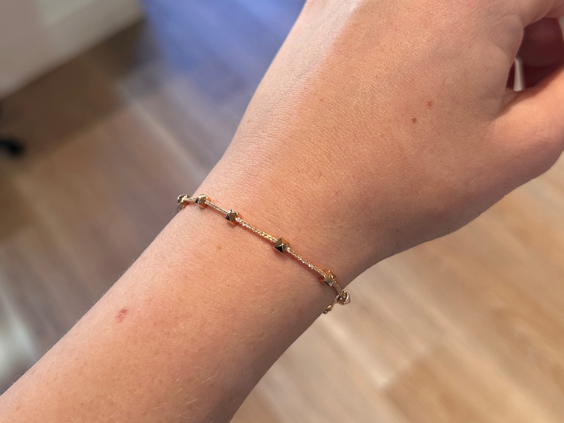 AD21, 14kt gold bracelet with pave diamond bars and stud detail