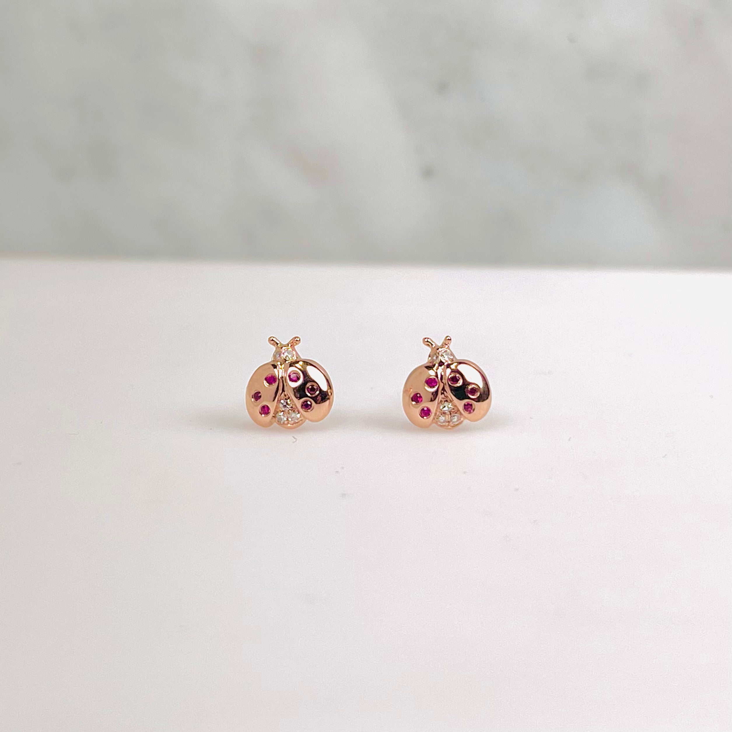 WD1014 14kt gold and Ruby ladybug studs